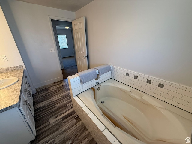 5509 S 2150 W, Roy, UT 84067 - full bath featuring vanity, a bath, and wood finished floors