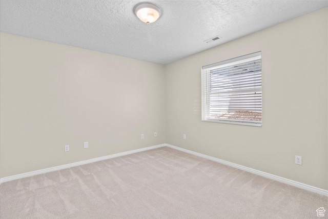 231 S 200 E, Manti, UT 84642 - carpeted spare room with baseboards and a textured ceiling