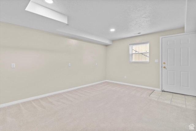 231 S 200 E, Manti, UT 84642 - basement featuring light carpet, a textured ceiling, and recessed lighting