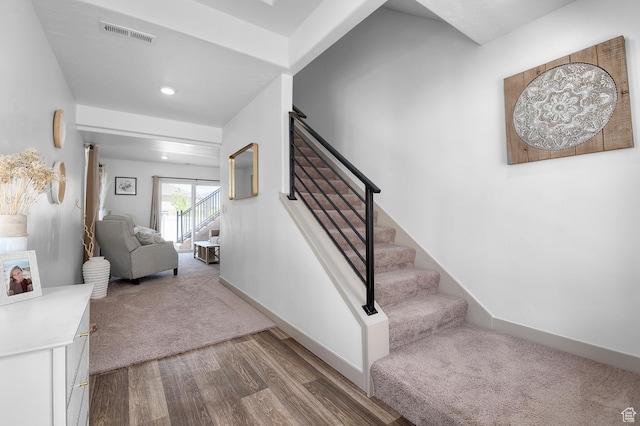 106 E Polaris Dr, Saratoga Springs, UT 84045 - staircase with wood finished floors and carpet floors