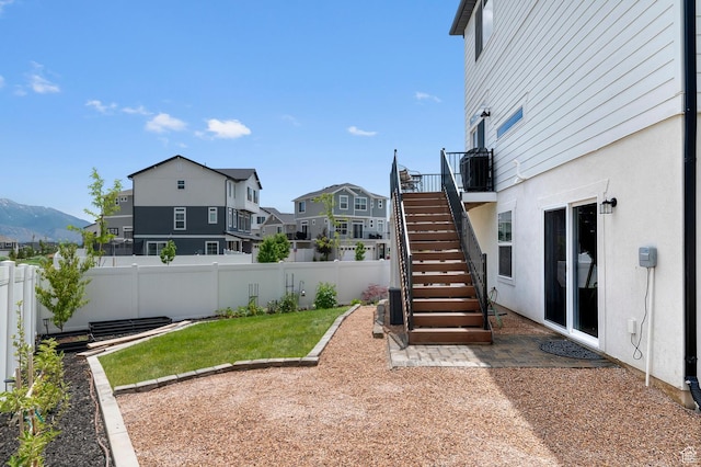 106 E Polaris Dr, Saratoga Springs, UT 84045 - fenced backyard with a residential view and stairway