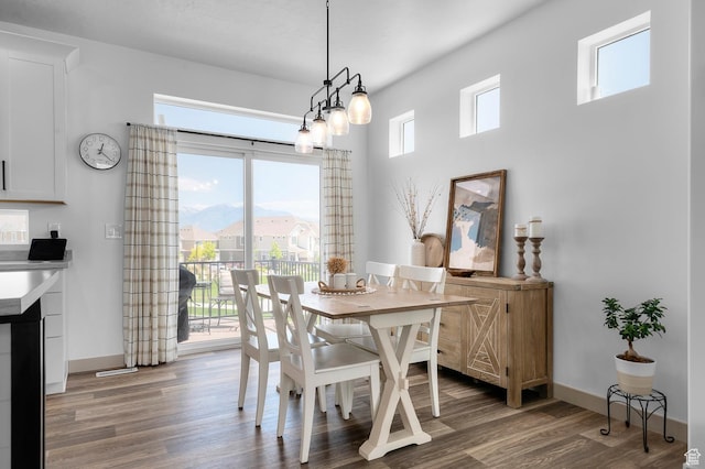 106 E Polaris Dr, Saratoga Springs, UT 84045 - dining area with wood finished floors and baseboards
