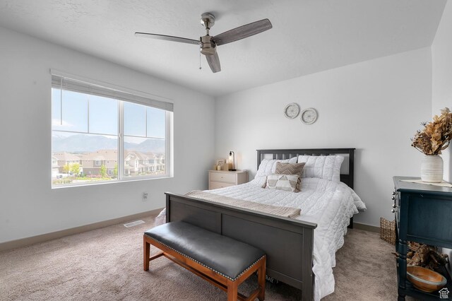 106 E Polaris Dr, Saratoga Springs, UT 84045 - carpeted bedroom featuring baseboards and a ceiling fan