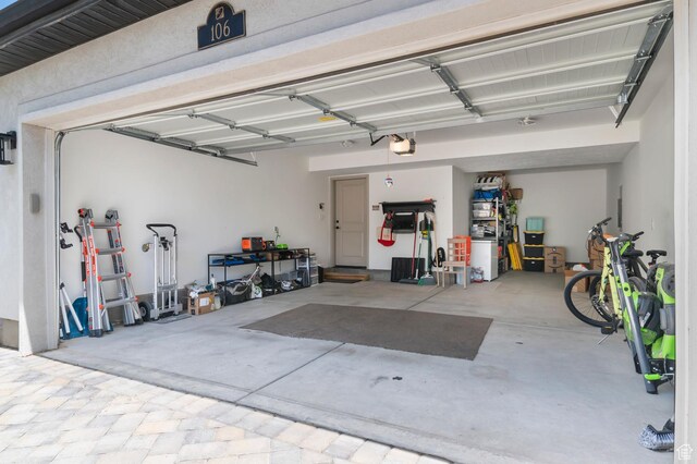 106 E Polaris Dr, Saratoga Springs, UT 84045 - garage featuring a garage door opener