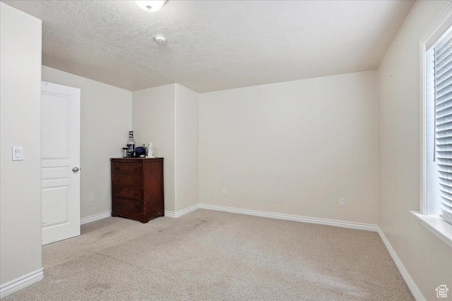 3634 N 225 E, North Ogden, UT 84414 - unfurnished bedroom featuring light colored carpet and a textured ceiling