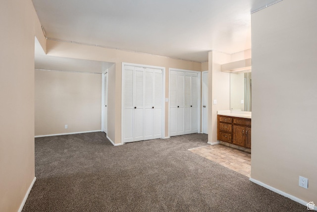330 E Peach Ln, Bountiful, UT 84010 - unfurnished bedroom with carpet flooring, two closets, and ensuite bath