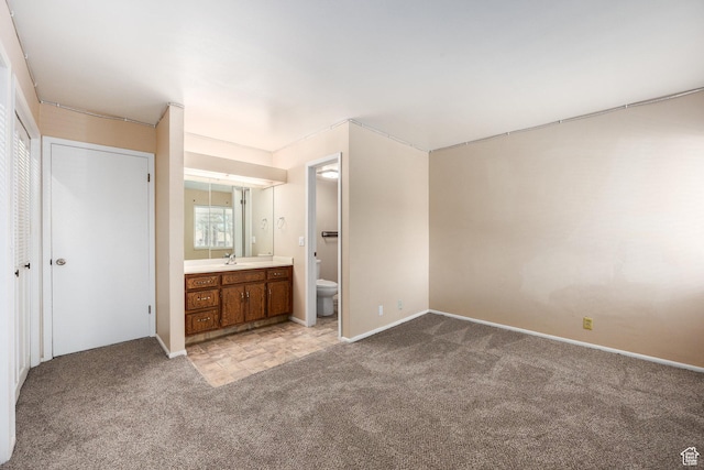 330 E Peach Ln, Bountiful, UT 84010 - unfurnished bedroom featuring light colored carpet and connected bathroom