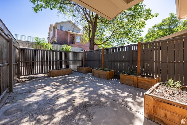 330 E Peach Ln, Bountiful, UT 84010 - fenced backyard with a patio