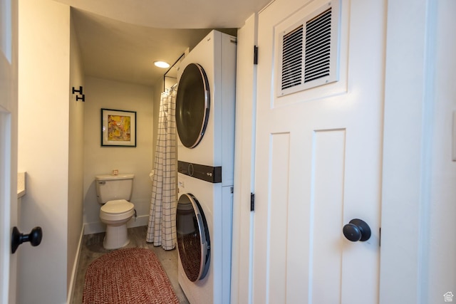 68 W 3600 S, Bountiful, UT 84010 - bathroom featuring stacked washer and clothes dryer and recessed lighting