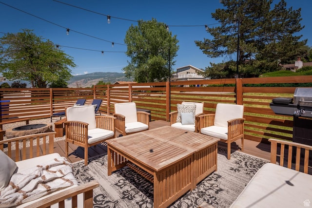 68 W 3600 S, Bountiful, UT 84010 - wooden terrace with a mountain view and an outdoor living space with a fire pit