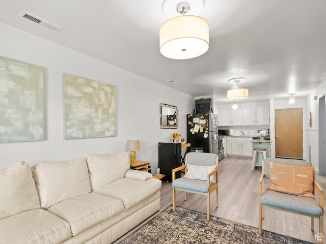 425 S 1000 E Unit 402C, Salt Lake City, UT 84102 - living area with light wood finished floors