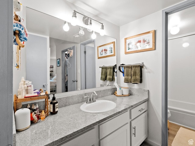 425 S 1000 E Unit 402C, Salt Lake City, UT 84102 - bathroom featuring vanity, wood finished floors, and shower / tub combination