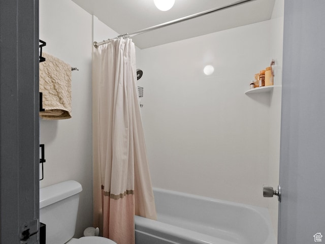 425 S 1000 E Unit 402C, Salt Lake City, UT 84102 - bathroom featuring shower / bath combo with shower curtain and toilet
