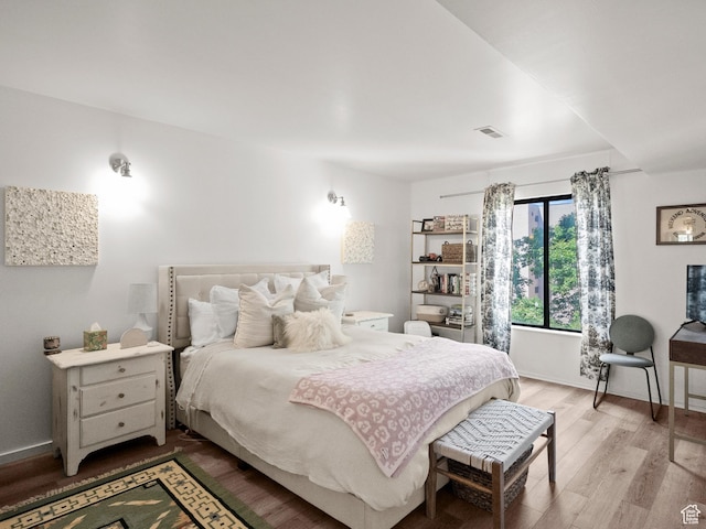 425 S 1000 E Unit 402C, Salt Lake City, UT 84102 - bedroom featuring light wood-type flooring and baseboards