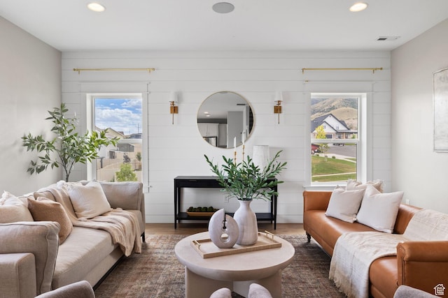 3256 S Iron Hill Cir, Saratoga Springs, UT 84045 - living room featuring healthy amount of natural light, recessed lighting, and dark wood-style flooring