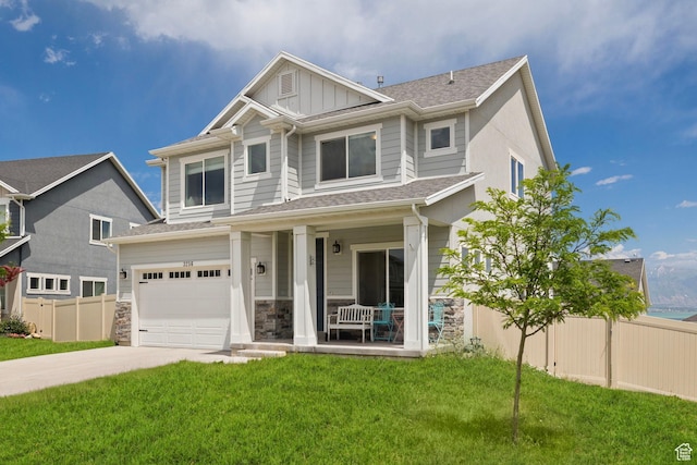 3256 S Iron Hill Cir, Saratoga Springs, UT 84045 - craftsman-style house with a porch, a garage, concrete driveway, board and batten siding, and roof with shingles