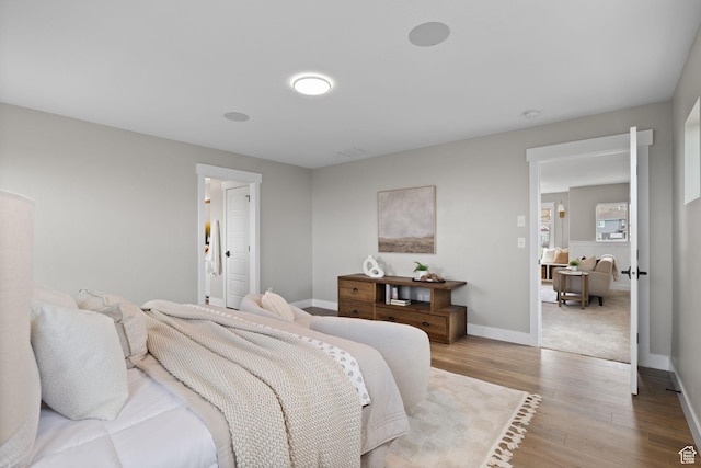 3256 S Iron Hill Cir, Saratoga Springs, UT 84045 - bedroom with wood finished floors and baseboards