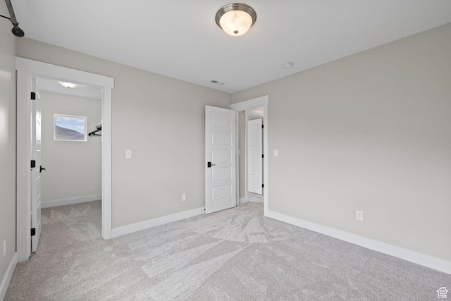 3256 S Iron Hill Cir, Saratoga Springs, UT 84045 - unfurnished bedroom with light carpet and a spacious closet