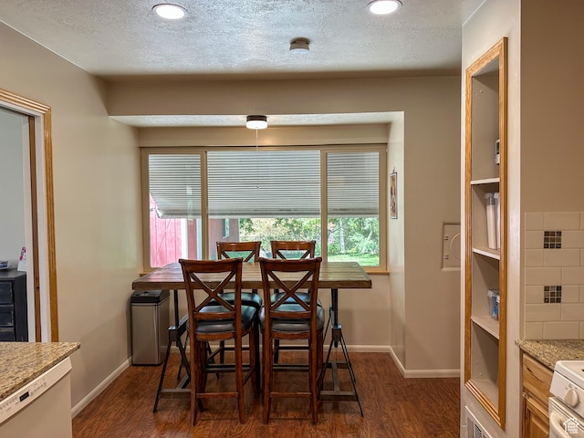 3269 Liberty Ave, Ogden, UT 84403 - dining area featuring dark wood-style floors, recessed lighting, and a textured ceiling