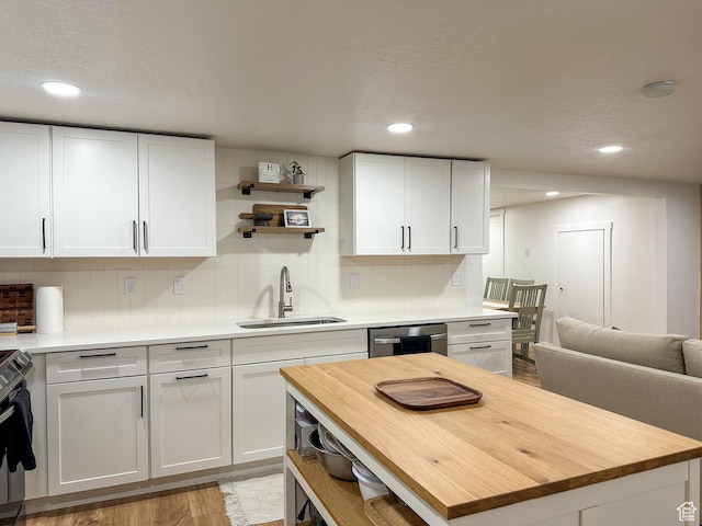 3269 Liberty Ave, Ogden, UT 84403 - kitchen featuring butcher block counters, appliances with stainless steel finishes, open shelves, white cabinets, and recessed lighting