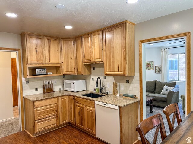 3269 Liberty Ave, Ogden, UT 84403 - kitchen featuring white appliances, decorative backsplash, light stone countertops, dark wood-style floors, and recessed lighting
