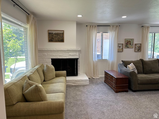 3269 Liberty Ave, Ogden, UT 84403 - carpeted living room with a fireplace and recessed lighting