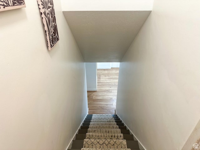 3269 Liberty Ave, Ogden, UT 84403 - stairway featuring wood finished floors and baseboards