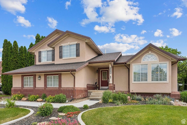 1087 W Barnes Dr, Kaysville, UT 84037 - view of front of house featuring stucco siding and a front lawn