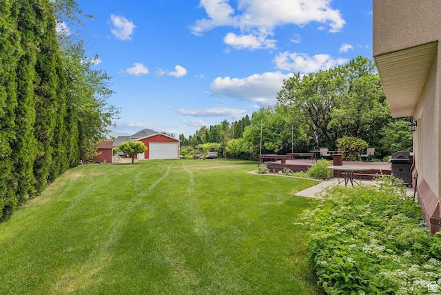 1087 W Barnes Dr, Kaysville, UT 84037 - view of grassy yard with a detached garage