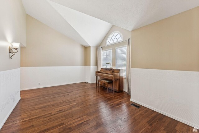 1087 W Barnes Dr, Kaysville, UT 84037 - additional living space with wood finished floors and vaulted ceiling