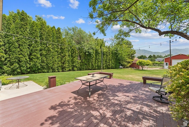 1087 W Barnes Dr, Kaysville, UT 84037 - view of patio featuring a deck with mountain view and an outbuilding