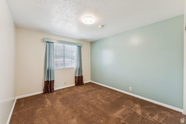 1087 W Barnes Dr, Kaysville, UT 84037 - carpeted empty room featuring a textured ceiling and a smoke detector