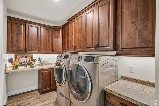 1472 W Pocket Mesa Dr, St George, UT 84770 - laundry area featuring cabinet space, washing machine and dryer, and light wood-style floors