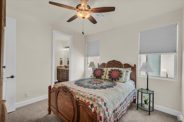 1472 W Pocket Mesa Dr, St George, UT 84770 - bedroom with carpet flooring, connected bathroom, and a ceiling fan