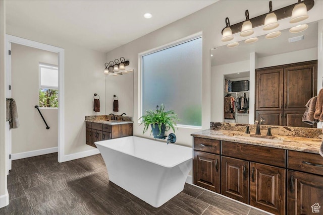 1472 W Pocket Mesa Dr, St George, UT 84770 - full bathroom featuring a freestanding bath and vanity