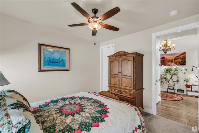 1472 W Pocket Mesa Dr, St George, UT 84770 - bedroom featuring a chandelier and ceiling fan