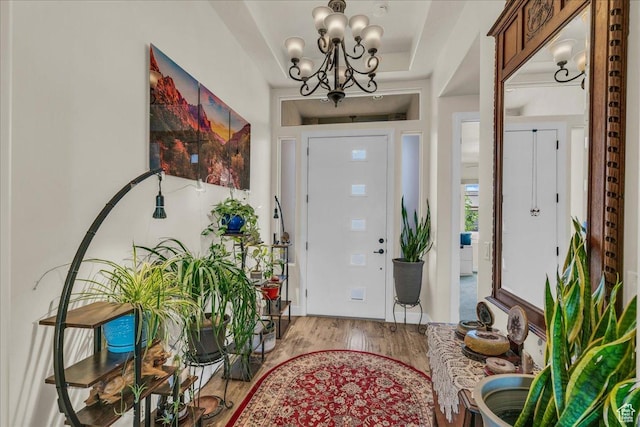 1472 W Pocket Mesa Dr, St George, UT 84770 - foyer featuring a chandelier and wood finished floors