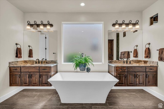 1472 W Pocket Mesa Dr, St George, UT 84770 - full bathroom featuring a soaking tub, two vanities, and recessed lighting