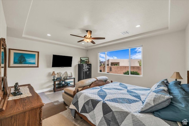 1472 W Pocket Mesa Dr, St George, UT 84770 - bedroom with a tray ceiling, recessed lighting, and ceiling fan