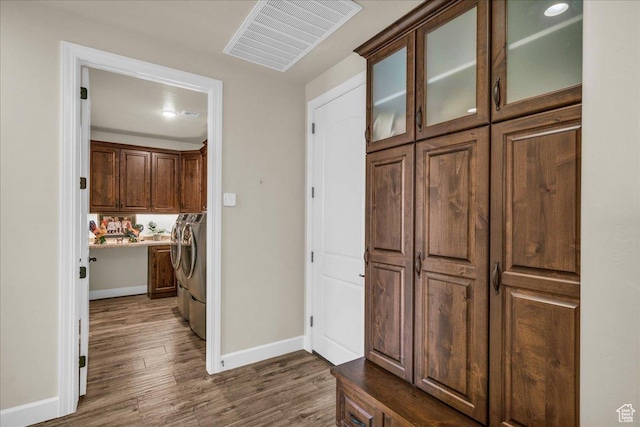 1472 W Pocket Mesa Dr, St George, UT 84770 - corridor featuring washer and clothes dryer and dark wood-style flooring
