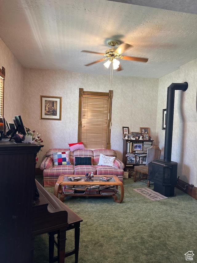 225 N 200 W, Tooele, UT 84074 - carpeted living room featuring a wood stove, ceiling fan, and a textured wall