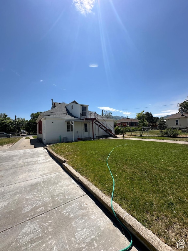 225 N 200 W, Tooele, UT 84074 - view of side of home with stairs