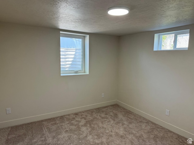 1371 E Skyview Dr, Millcreek, UT 84124 - carpeted spare room with baseboards and a textured ceiling