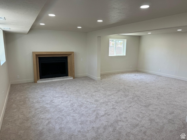 1371 E Skyview Dr, Millcreek, UT 84124 - unfurnished living room with recessed lighting, carpet, and a fireplace