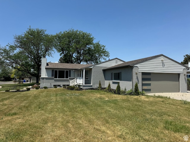 1371 E Skyview Dr, Millcreek, UT 84124 - single story home with brick siding, a front yard, a chimney, an attached garage, and driveway