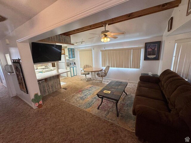 1225 N Dixie Downs Rd Unit 100, St George, UT 84770 - carpeted living area featuring ceiling fan and beam ceiling