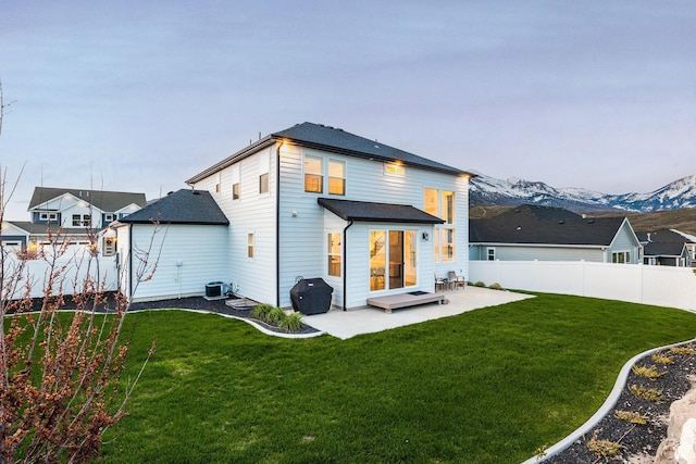 2452 E Lone Hill Dr Unit 324, Draper Ut Cnty, UT 84020 - rear view of property with a patio area and a mountain view