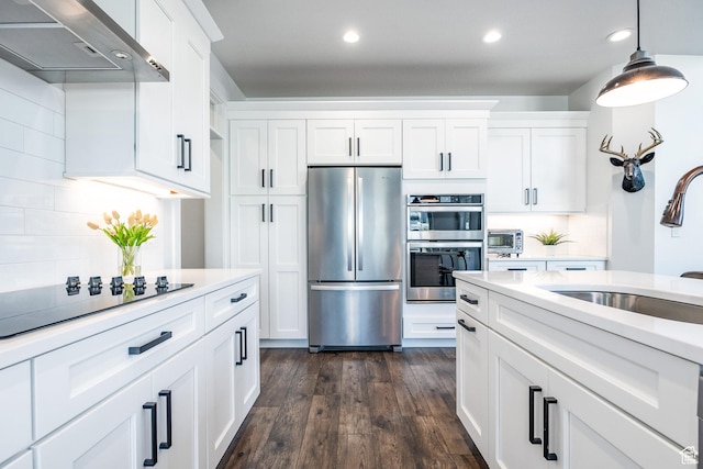 2452 E Lone Hill Dr Unit 324, Draper Ut Cnty, UT 84020 - kitchen featuring appliances with stainless steel finishes, exhaust hood, recessed lighting, white cabinetry, and light countertops