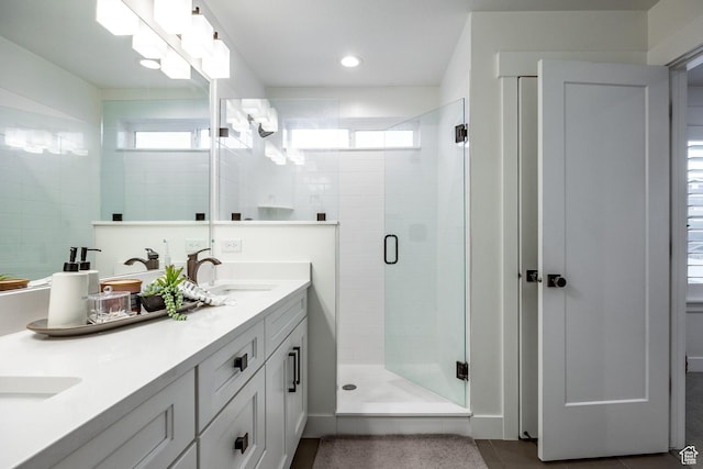 2452 E Lone Hill Dr Unit 324, Draper Ut Cnty, UT 84020 - full bath featuring a stall shower, double vanity, tile patterned flooring, and recessed lighting