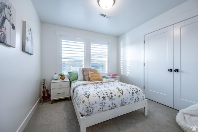 2452 E Lone Hill Dr Unit 324, Draper Ut Cnty, UT 84020 - carpeted bedroom featuring a closet and baseboards